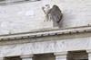 The Fed presses harder on the brakes