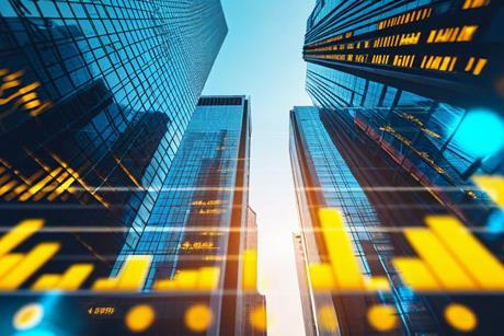 Skyscrapers with overlay of financial graphs